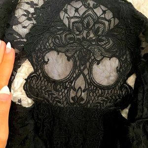 Black dress with skull detailing on the back🖤